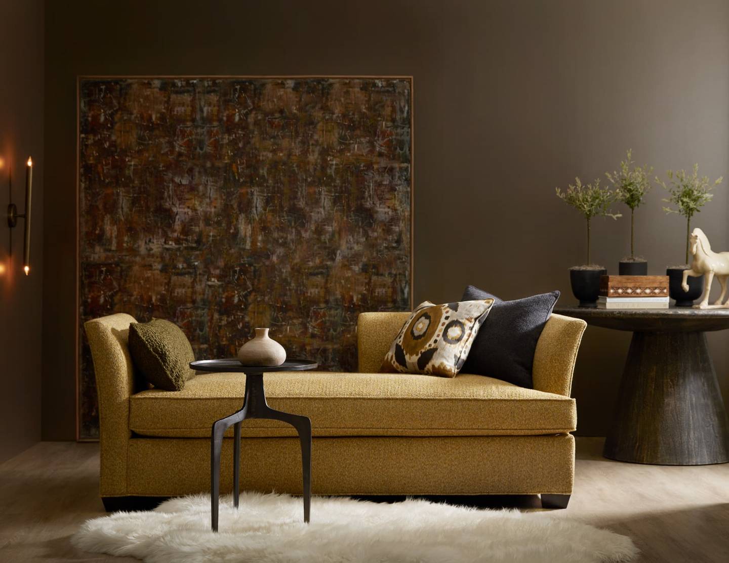 Settee in golden mustard textured fabric with flared arms